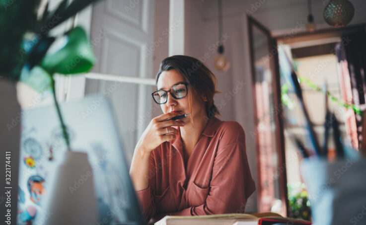 Woman at home using a laptop