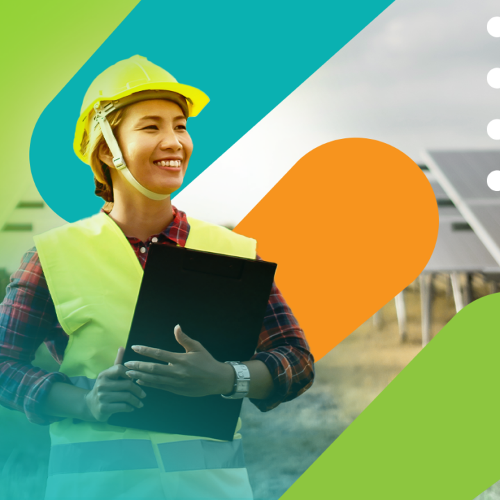 Smiling woman in hard hat in front of a bright EHRC background.
