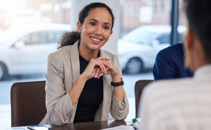 Woman in an office for a business meeting, discussion and networking with candidate.