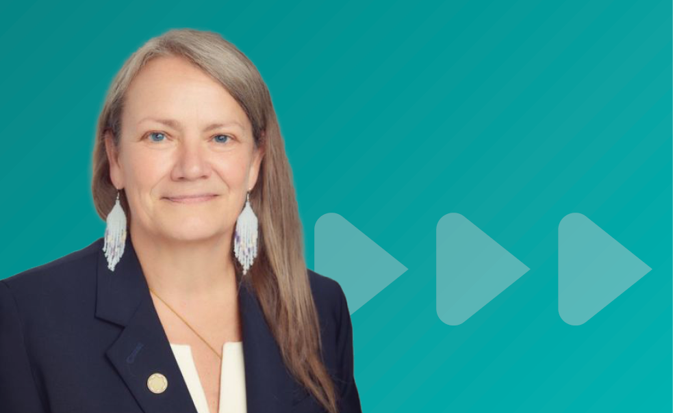 Photo of Kimberly Murray on a teal background