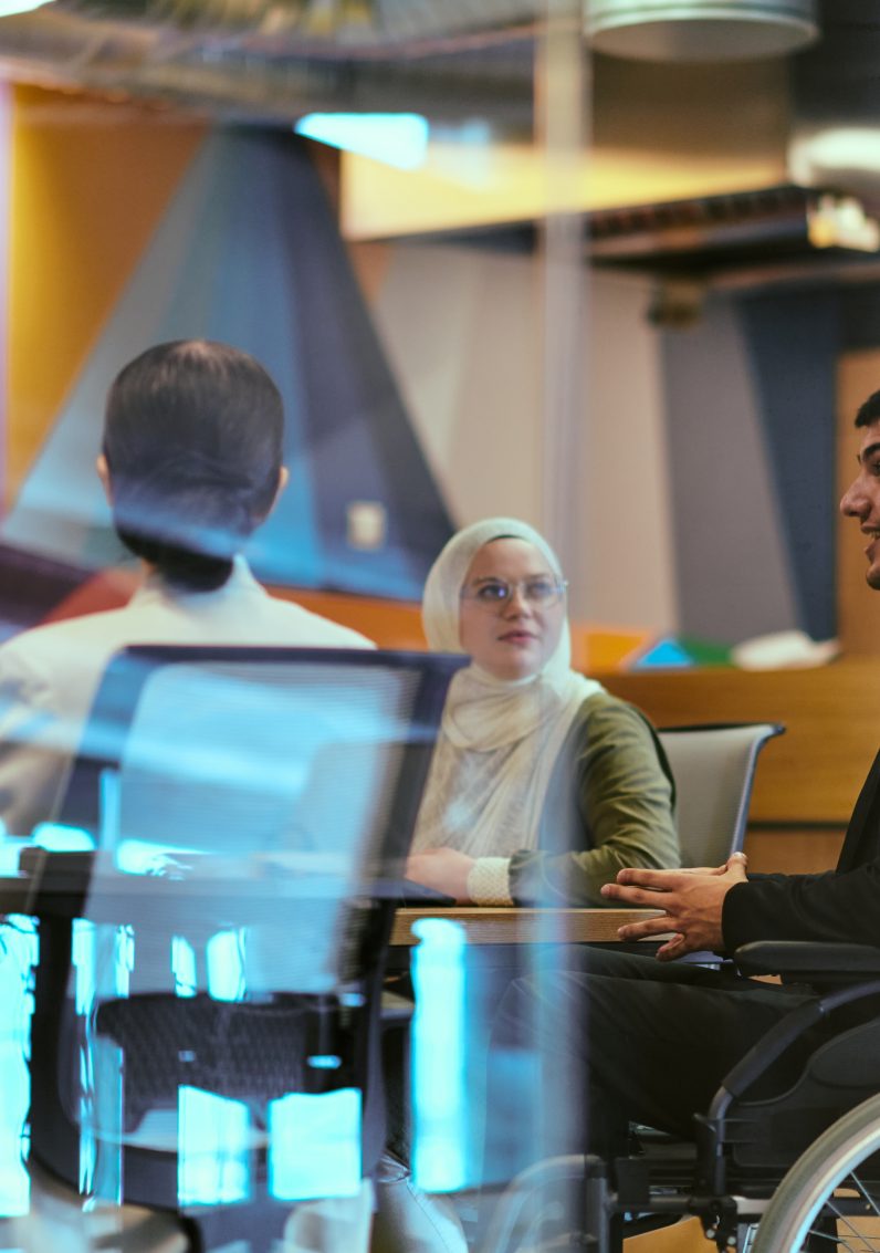 A group of divers people in a meeting